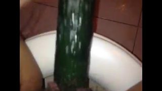 chinese fuck herself with cucumber