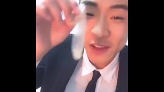 Cute chinese boy cumming on a condom and eating some