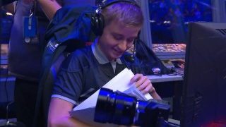 The perfect flower OG.N0tail looks at his papers at TI9 PSG.LGD vs OG